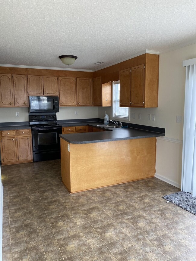 Building Photo - 4033 Cobblestone Dr