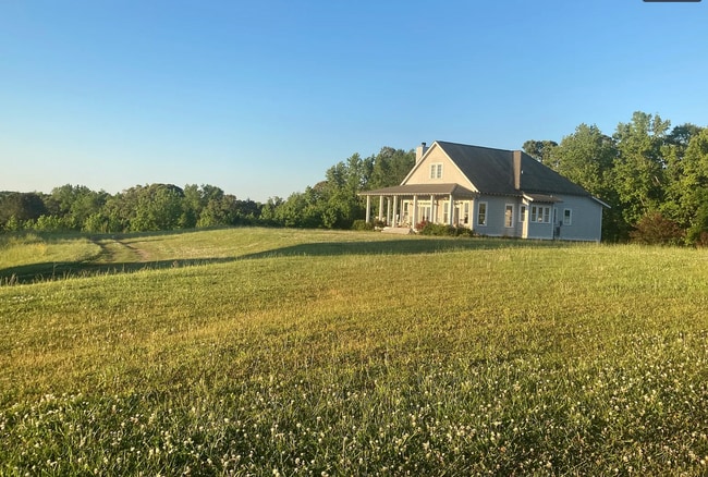 Building Photo - Turnkey Furnished Home on 5 Acres – Just B...