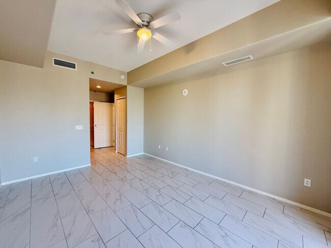 Building Photo - Modern High-Rise Condo with Stunning City and Mountain Views-Near LV Strip, Allegiant Stadium, To...