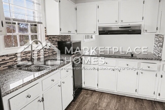 Building Photo - 201 Larkwood Dr SW