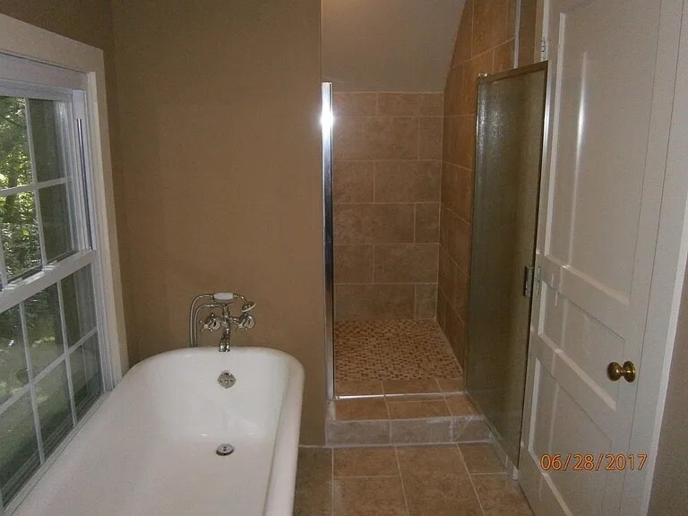 Claw foot tub and walkin shower - 709 S Dickerson Rd