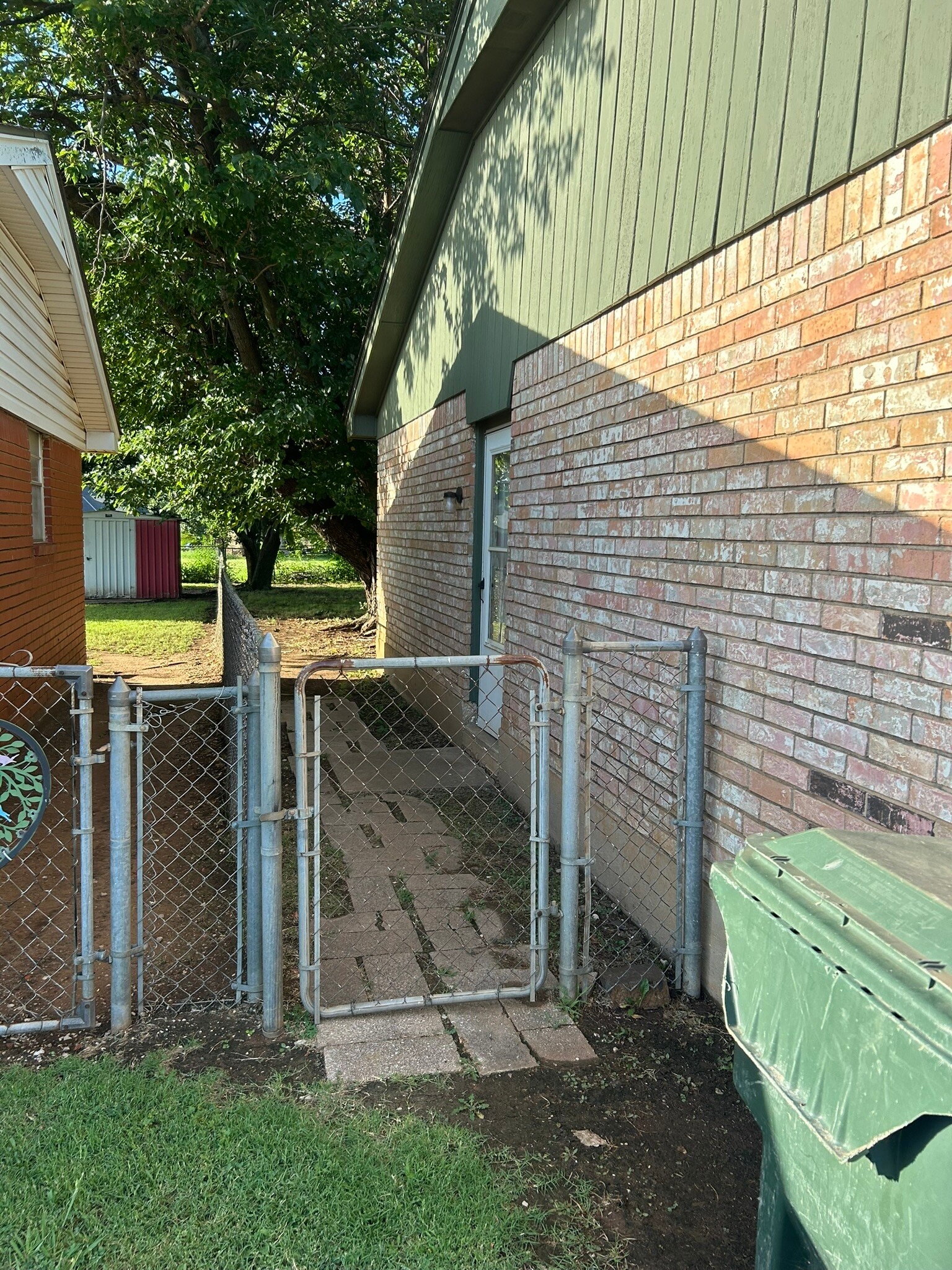 side of house. side door into the garage. - 1317 Lakecrest Dr
