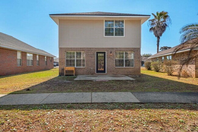 Building Photo - LAKE FRONT HOME & GATED COMMUNITY WITH COMMUNITY POOL IN NAVARRE!
