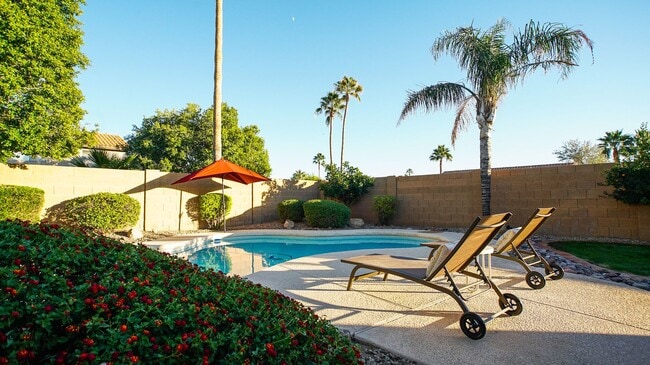 Building Photo - Heated Pool Home/Split Level Magic Zip Code