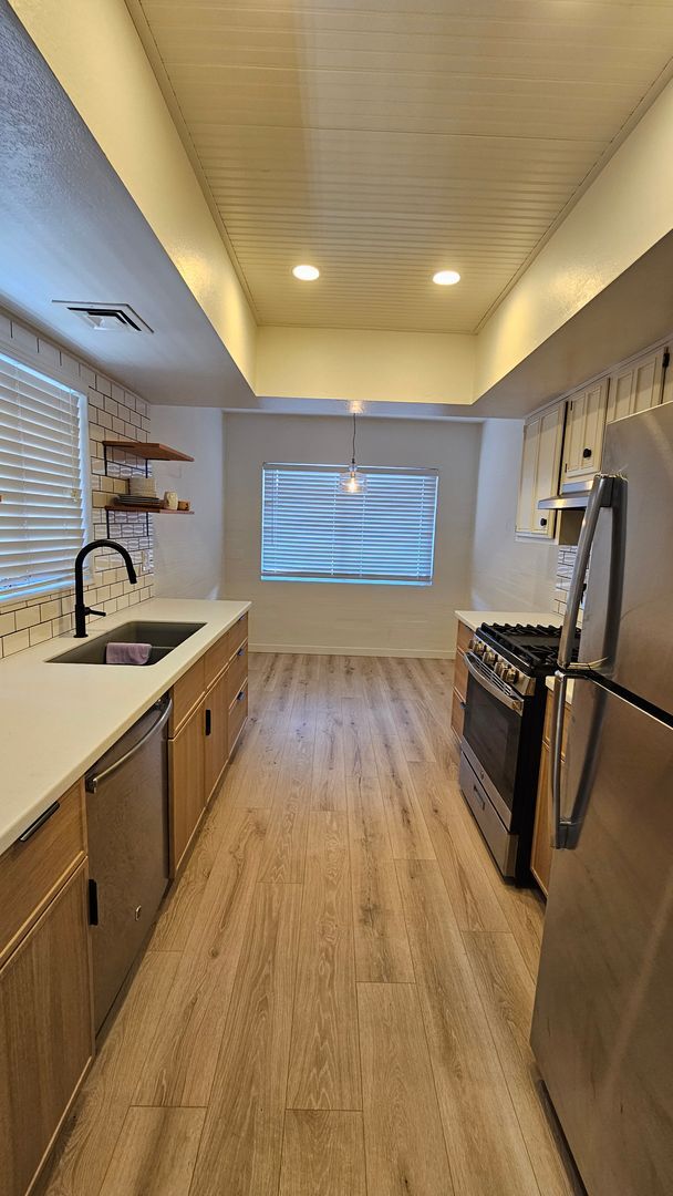 Building Photo - This is a must-see chic and updated townho...