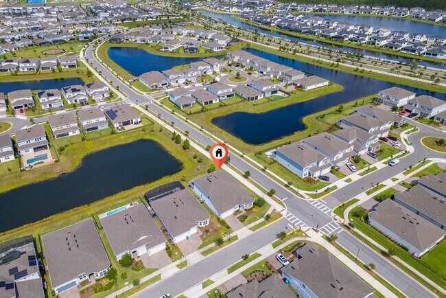 Building Photo - Immaculate Executive Home in Isles of Lake Nona