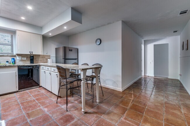 Two large refrigerators - 3310 Springwood Pl