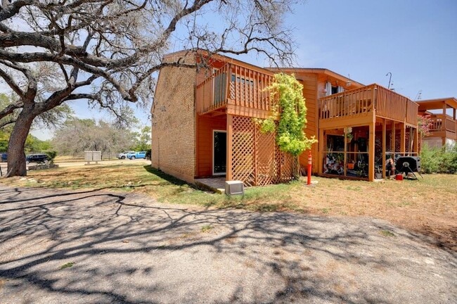 Building Photo - 10 Cypress Fairway Village