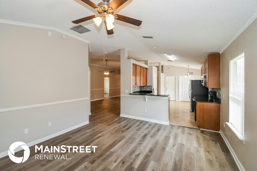 Building Photo - 7104 Rapid River Dr W