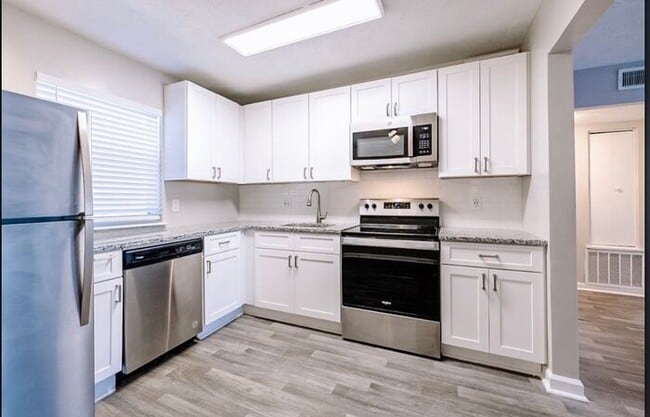 Building Photo - Modern Living at Westside Court