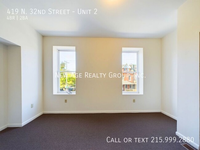 Building Photo - Spacious, Bi-level Apartment Available at ...