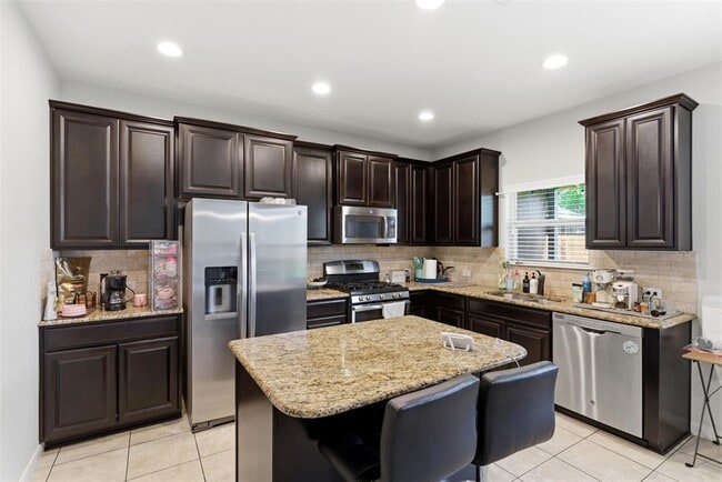 Building Photo - 2409 Muzzie Ln