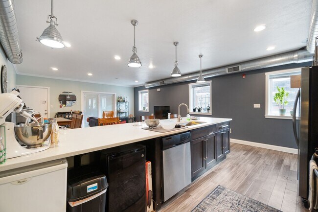 Building Photo - MASSIVE MODERN RENOVATION WITH OPEN LAYOUT...