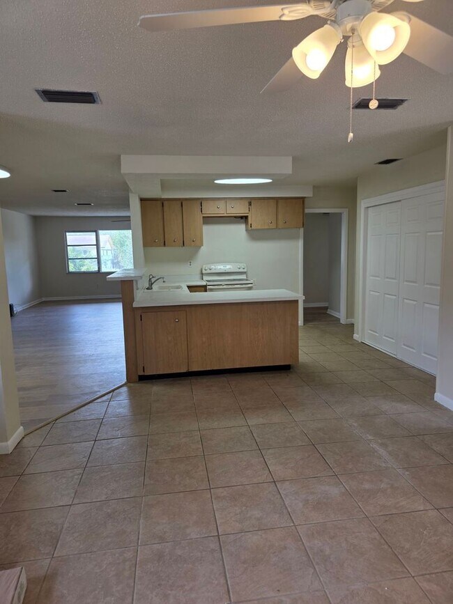 Building Photo - Spacious 3BR/2BA Home with 2-Car Carport & RV/Boat Parking