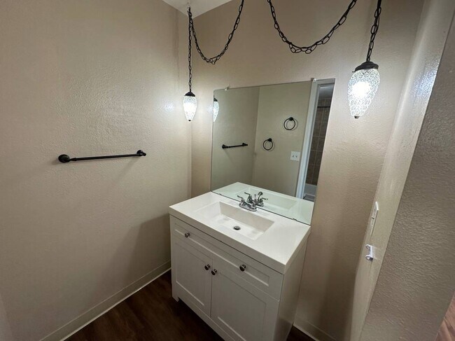 Step into elegance with this beautifully designed bathroom, perfect for relaxation. - Country Club