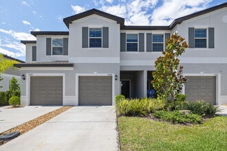 Building Photo - "Charming Gated community 3-Bed Retreat with Lake View & Granite Touches in Lutz!"