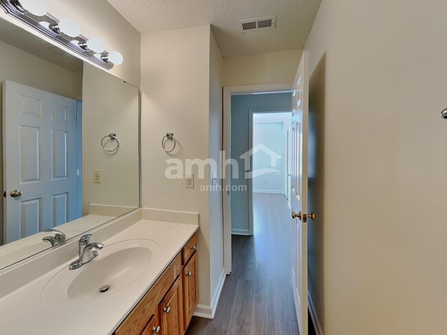 Building Photo - 5202 Carriage Woods Dr