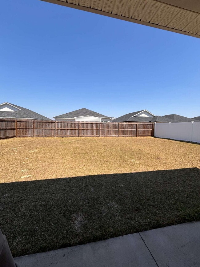 Building Photo - Need Space?  How about 5 bedrooms, 2.5 baths + an extra bonus area upstairs so that the kids can ...