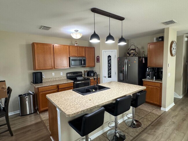 Building Photo - Gated Plant City Gem – Fully Upgraded Home- Resort Style Amenities