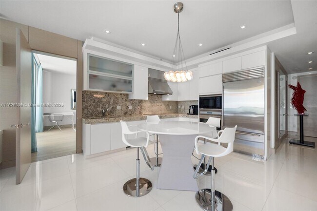 Building Photo - 9703 Collins Ave