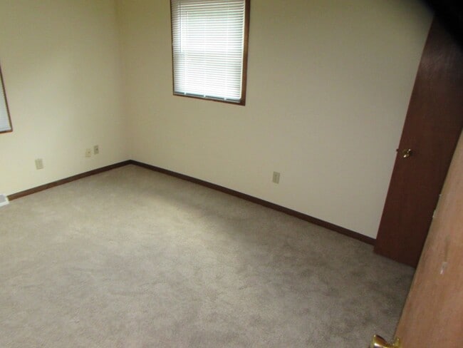 Building Photo - Spacious 3BD/1.5BA with Attached Garage and Backyard! - Available 4/1/2026