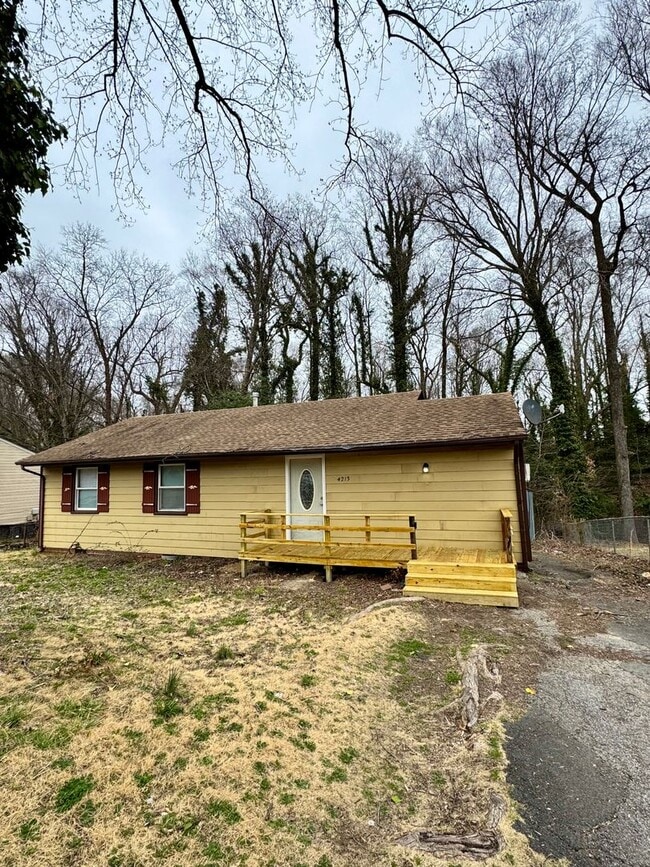 Building Photo - 3bed house in the county! Central all electric hvac, laundry, yard and hardwoods.