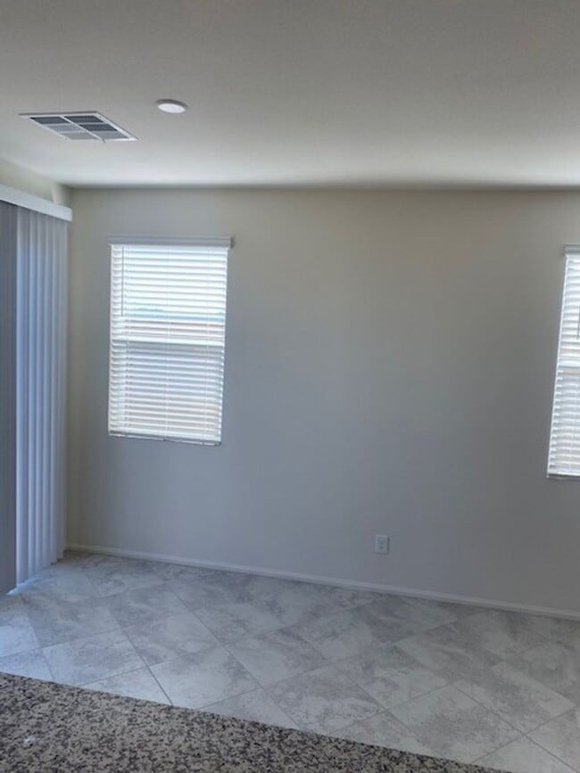 Building Photo - Beautiful Townhome in a Gated Community with 2-Car Garage!!