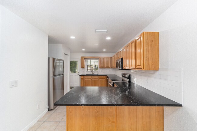 Building Photo - 3630 NE 8th Pl
