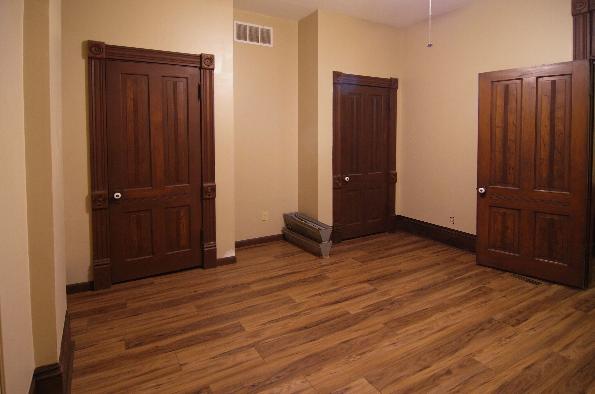 Second Bedroom with Closets. One closet is lined with cedar. - 418 N Main St