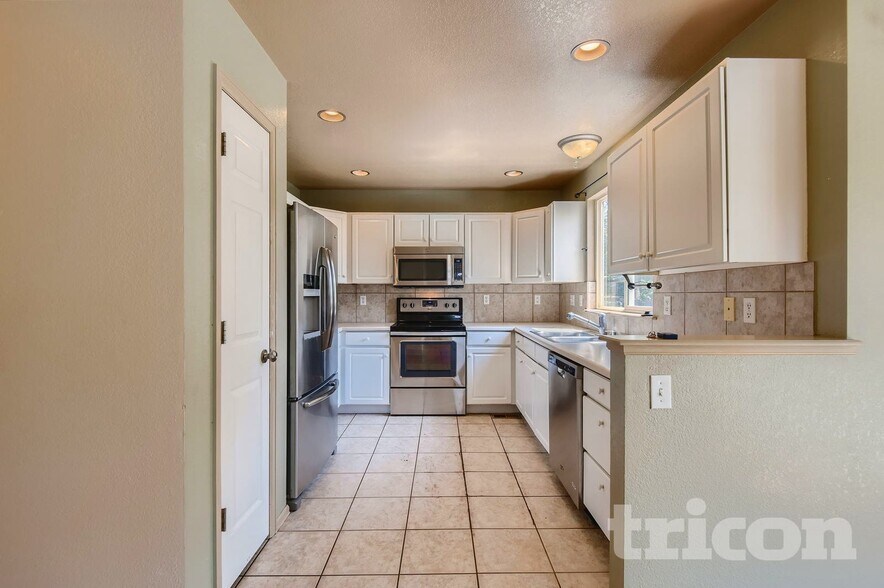 Building Photo - 5694 S Quemoy Ct