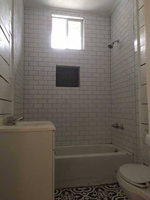 Brand new bathroom with original ship lap - 1131 W Lynwood Ave