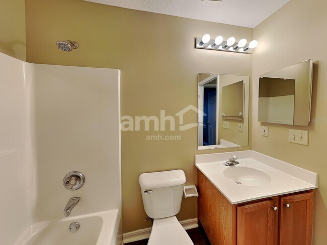 Building Photo - 6312 Satin Wood Dr