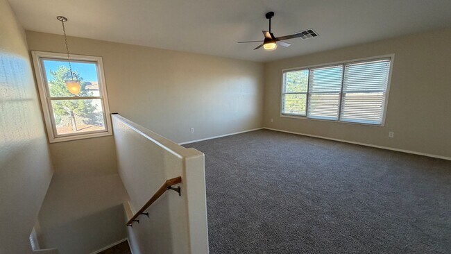 Building Photo - Spacious Surprise home with large backyard