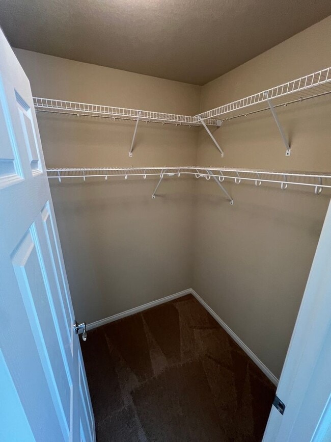 Building Photo - A Fantastic 4 Bedroom Home with the primary Downstairs, in Silverado Ranch