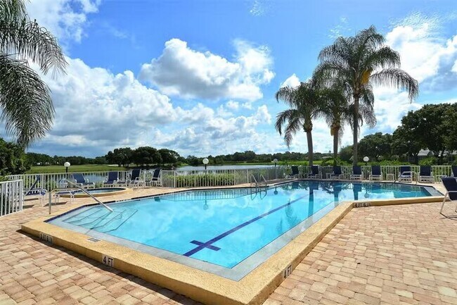 Building Photo - AVAILABLE JULY 1ST! Water & Golf Views in University Park Country Club with Pool and Spa!  3bed |...