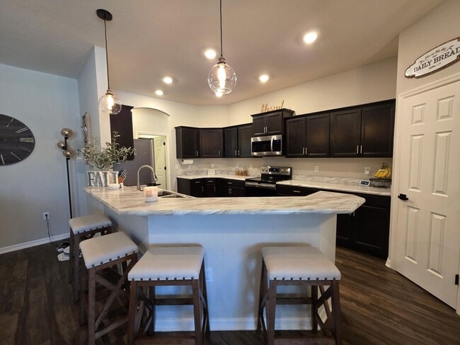 Building Photo - GORGEOUS 4-Bedroom, 3-Bathroom Pool Home, ...