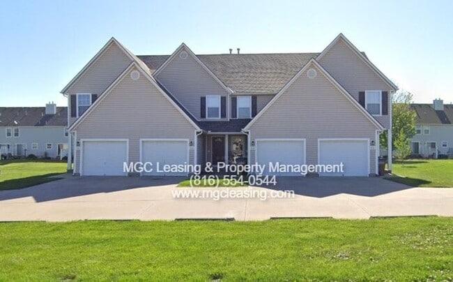 Primary Photo - Charming Raymore Retreat with Extra Storag...
