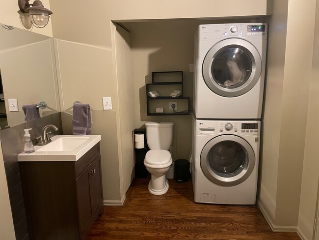 Primary bathroom w W/D and storage - 2000 Arapahoe St