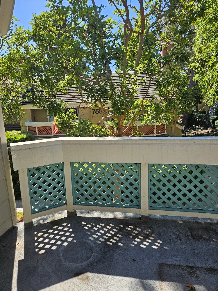 from master bedroom looking out to balcony - 7532 Seaspring Dr