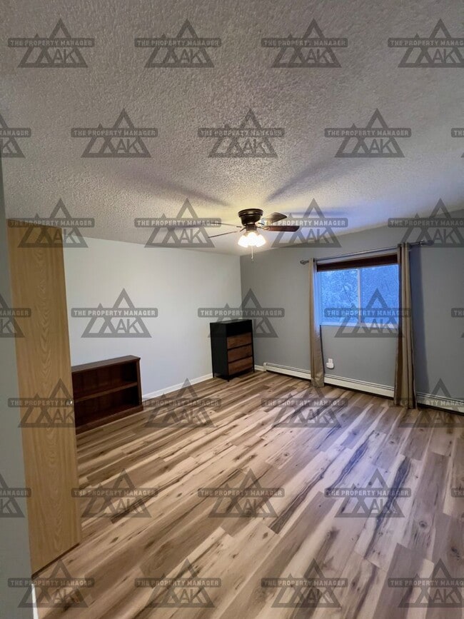 Building Photo - Charming Partially Furnished 2-Bedroom Condo for Rent