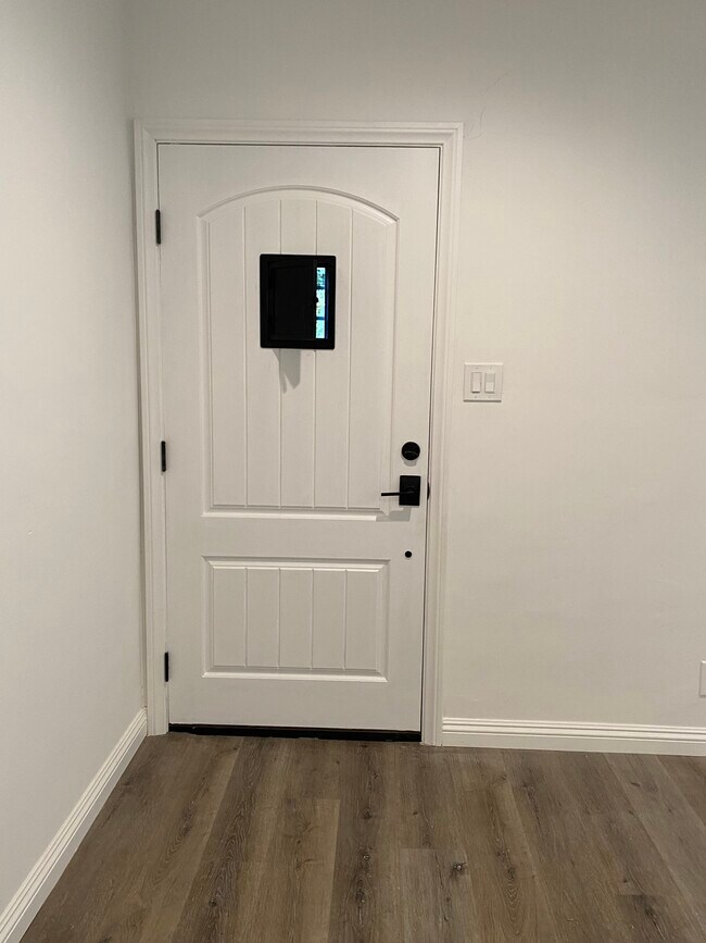 Front entry door from living room - 17423 Burbank Blvd
