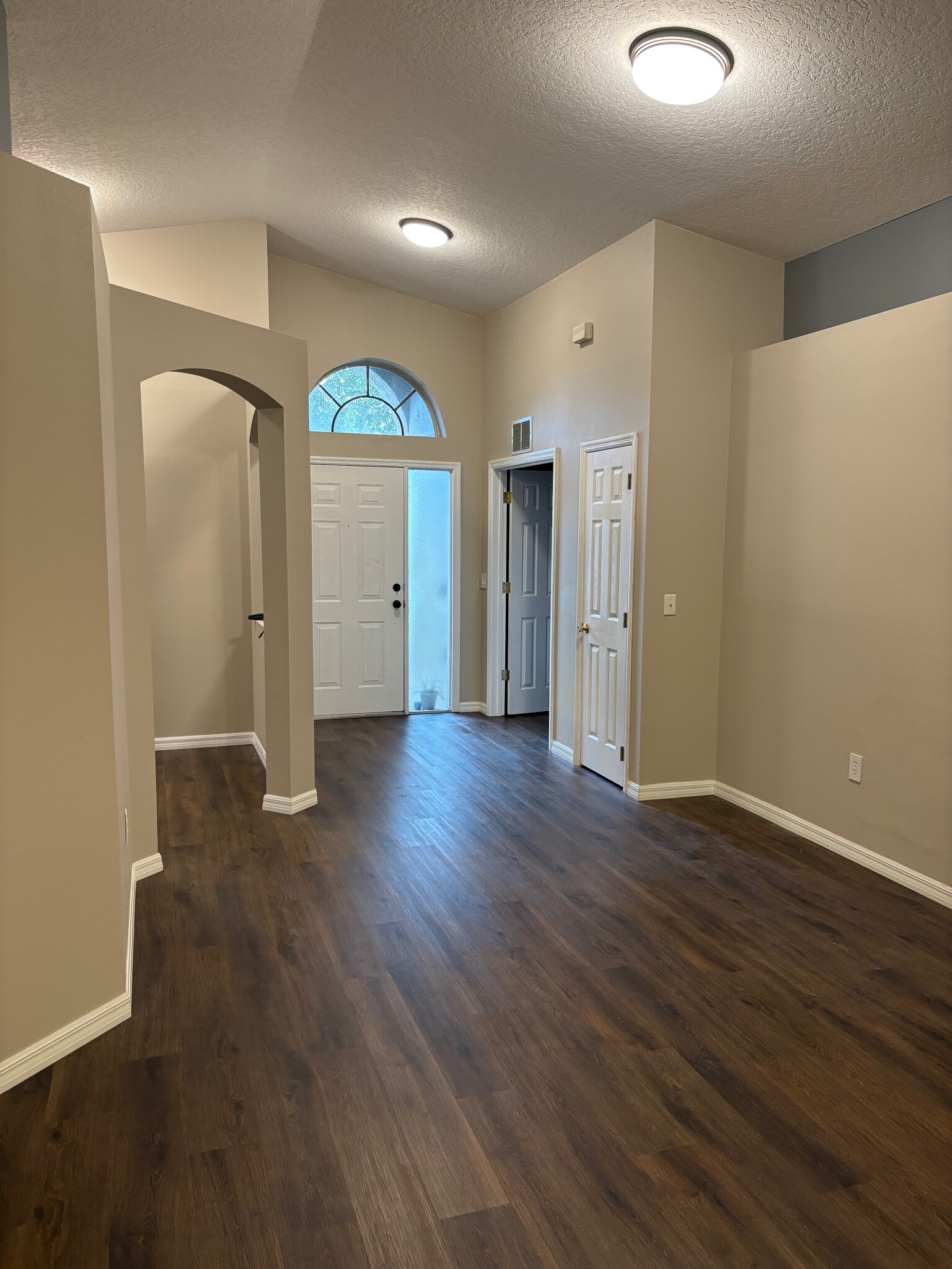 Main Living Area view towards Entryway - 2302 Northern Leaf St