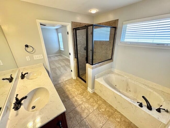 Building Photo - Gated Community 4 Bedroom 2.5 Bath Home In...