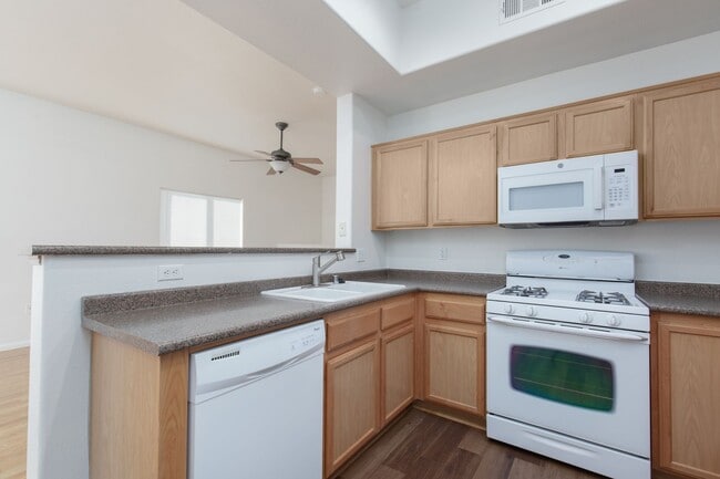 Building Photo - 1st floor unit with garage in gated Hender...