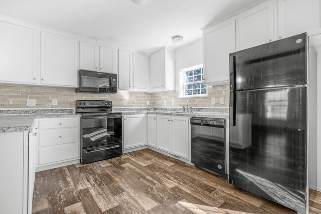 Building Photo - Sheridan Duplex Unit (no garage)