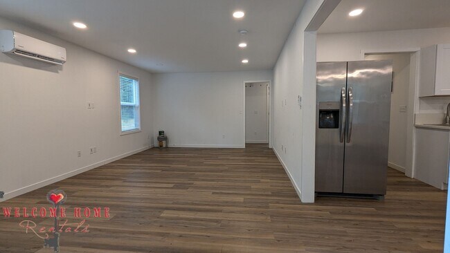 Building Photo - 4 bedroom home with air conditioning - Great location!!!  HUGE basement for your man cave or she ...