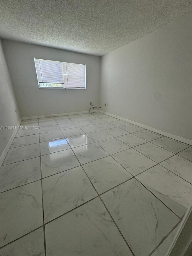 Building Photo - 8135 Sunrise Lakes Blvd