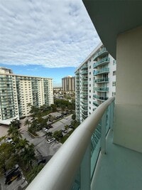 Building Photo - 19380 Collins Ave