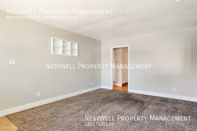 Building Photo - FREE 1ST MONTH'S RENT - Remodeled 2-bed Un...