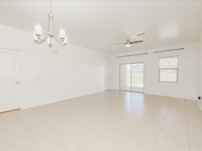 Building Photo - 3 Bedroom 2 Bathroom With Den      SOLAR PANELS! BRAND NEW FULL INTERIOR PAINT!! BRAND NEW EPOXY ...